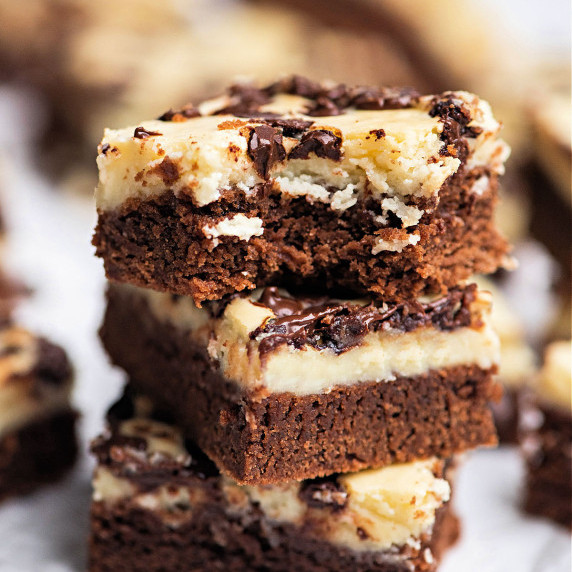 Stack of cheesecake brownies.