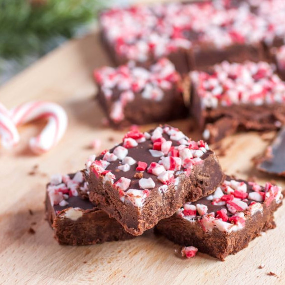 Chocolate peppermint fudge arranged on a cutting board