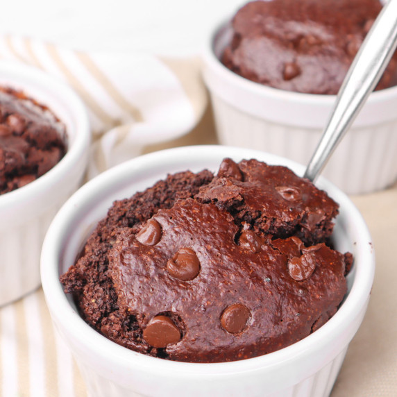 Chocolate Baked Oats in a white bowl with a spoon