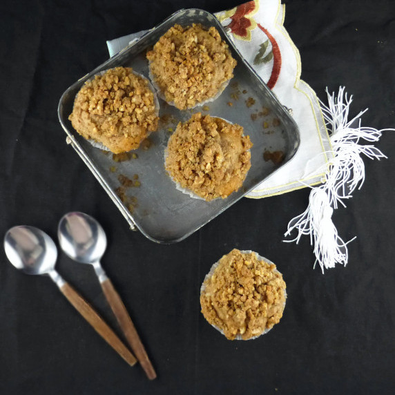 Overhead picture of muffins on a black background