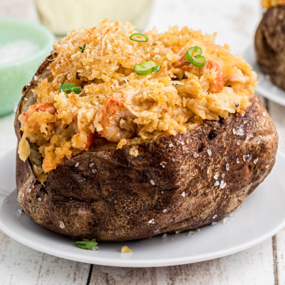Delicious baked potato loaded with a crawfish au gratin mixture.