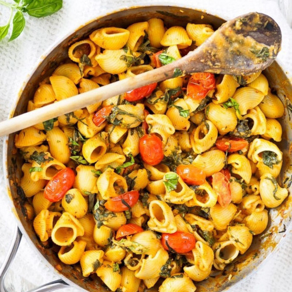 Skillet of tomato and spinach pasta.