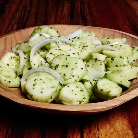 Cuernavaca Style Cucumber Salad serve in a wooden bowl