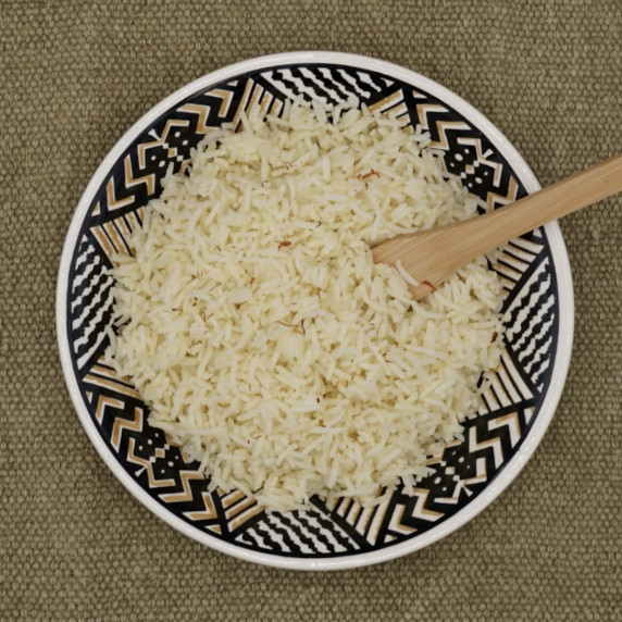 A bowl of pale yellow saffron rice