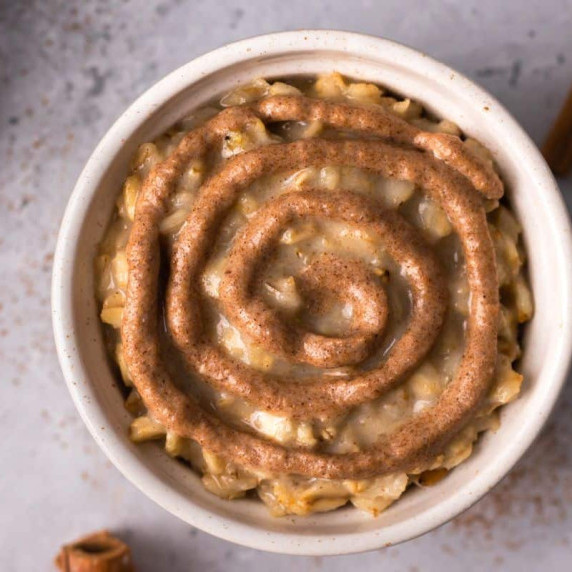 cinnamon roll egg oatmeal in a bowl