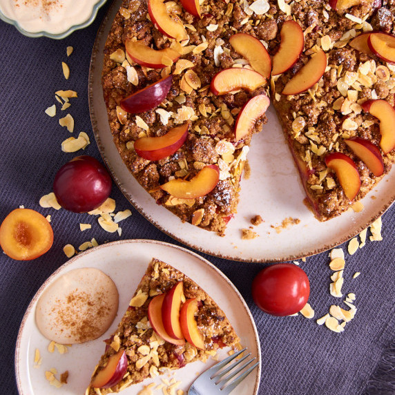 German plum streusel cake with shortcrust, topped with almond flakes and plum slices