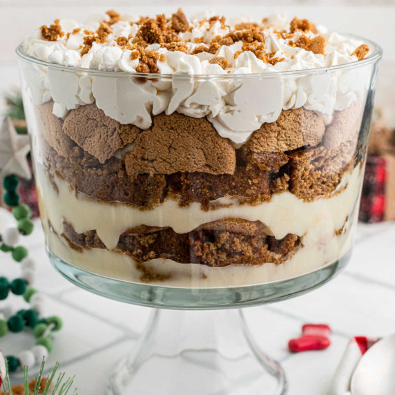 Close up of a trifle bowl filled with gingerbread trifle.