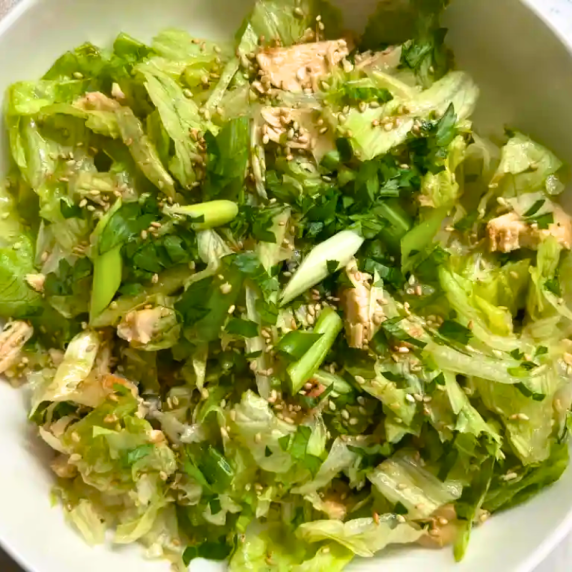 Chinese Chicken Salad with grilled chicken, iceberg lettuce, green onions, cilantro, and gluten-free