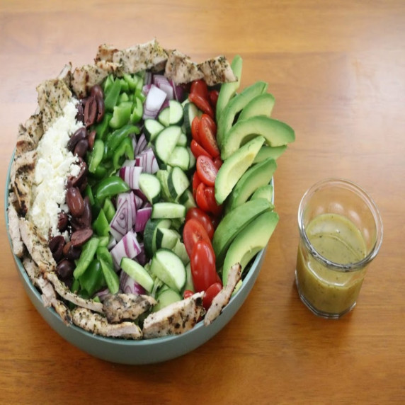 Bowl of Greek Salad with Chicken and Greek Dressing