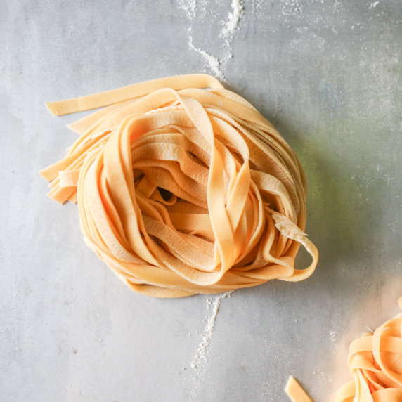 fresh homemade Italian fettuccine pasta made with a pasta maker