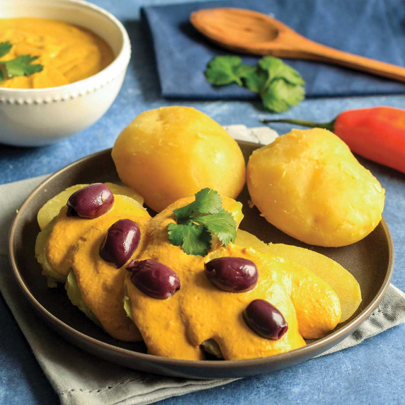 potatoes with cheese sauce on a plate