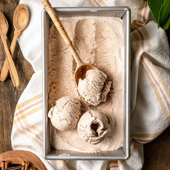 A loaf pan filled with cinnamon ice cream.