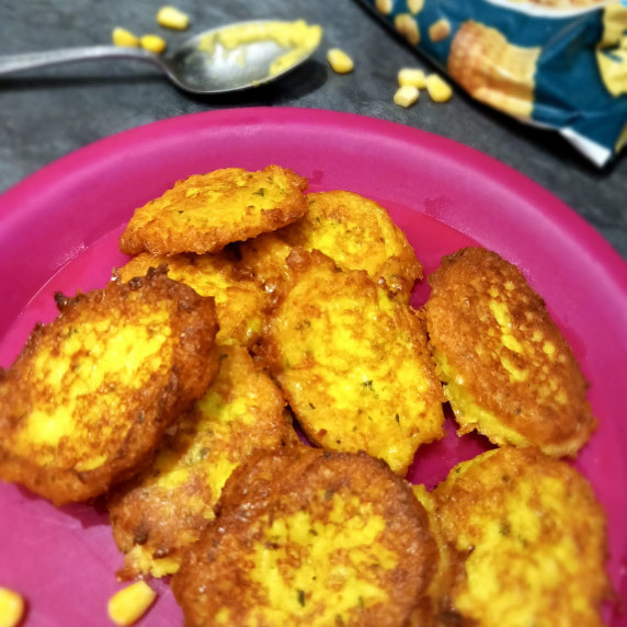 sweetcorn fritters served on a plate