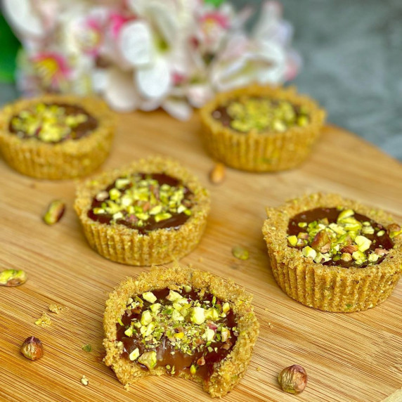 Easy Chocolate Mini Tarts On a wooden board 