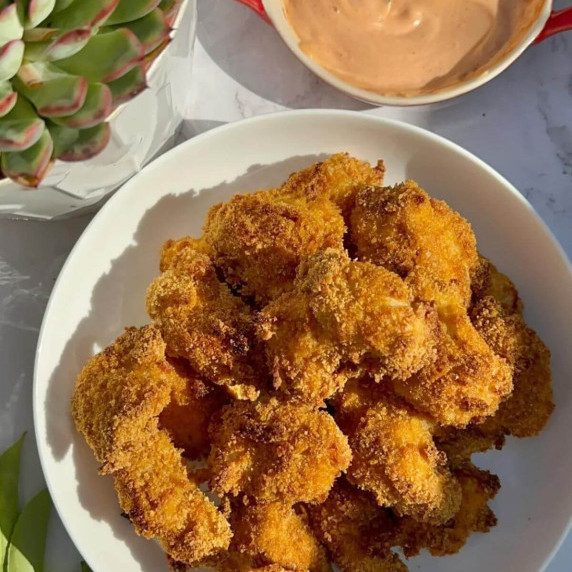 L Baked Cornflake Chicken Nuggets in a white shallow bowl