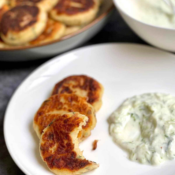 Tuna and potato patties served with Tzatziki sauce