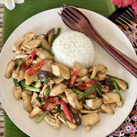 Thai mushroom stir-fry with chilies and green onions.