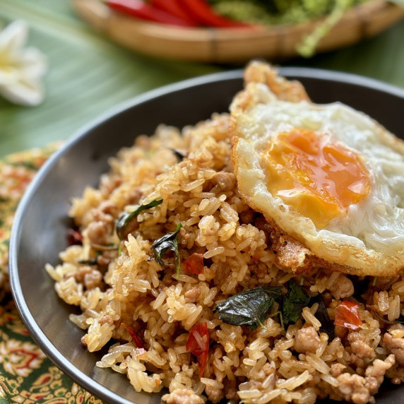 Khao pad krapow, holy basil fried rice, topped with a fried egg.