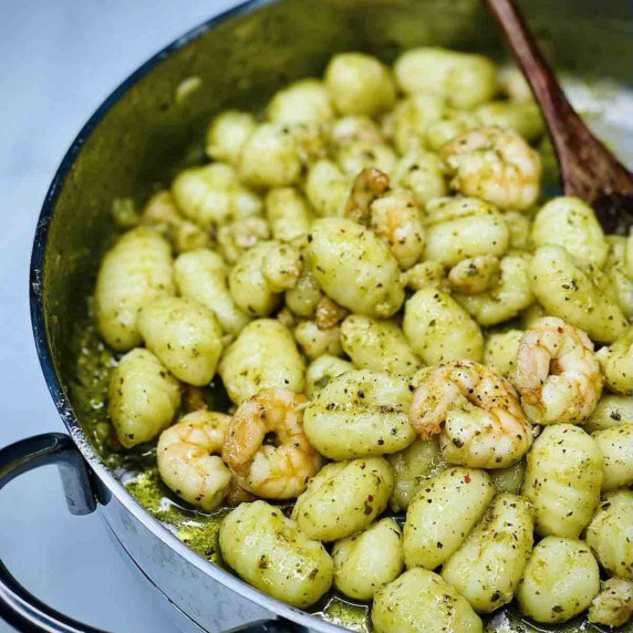 Pesto Shrimp Gnocchi In a stainless steel pan