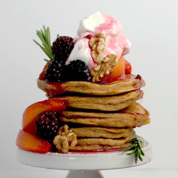 Sweet potato pancake stack with a rosemary and Madagascar vanilla bean infused whipped cream