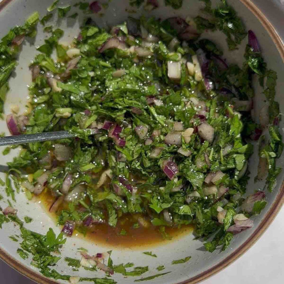 A bowl of chimichurri sauce