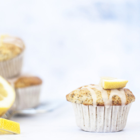 lemon poppyseed muffin on white background