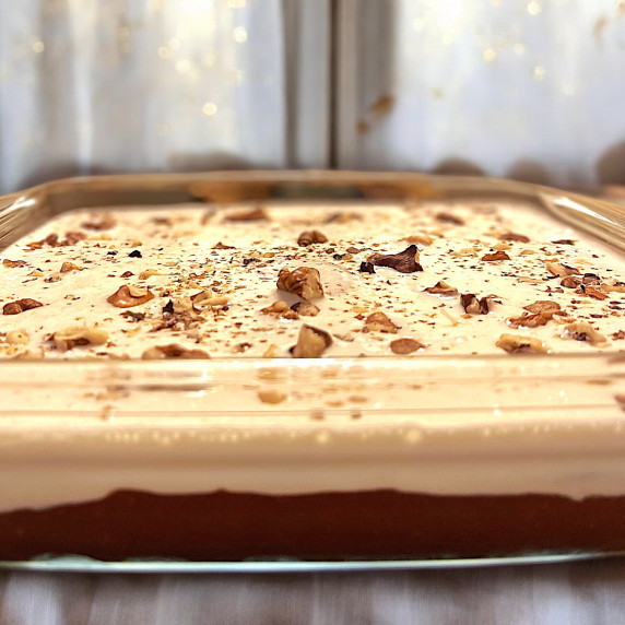 Chocolate Pudding arranged in a dish placed on marble countertop