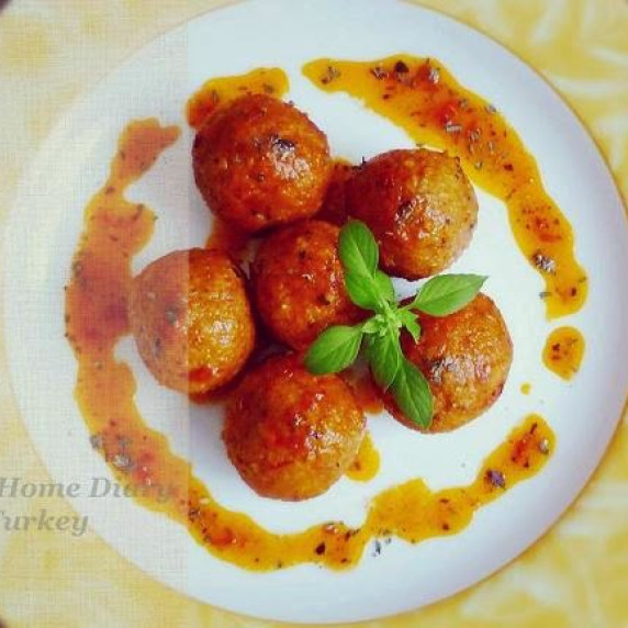 Turkis içli köfte (stuffed bulgur meatball) in basil tomato sauce.Çitra's Home Diary