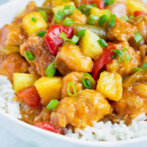 Instant Pot Hawaiian Pineapple Chicken RECIPE served over white rice.