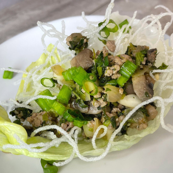Lean ground pork, water chestnuts, mushrooms and Thai vermicelli noodles wrapped in a lettuce leaf