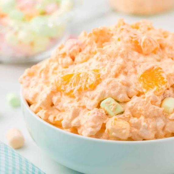 Mandarin orange salad in a white bowl.