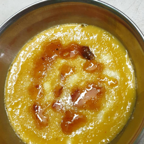 a bowl with Mango Crème Brûlée