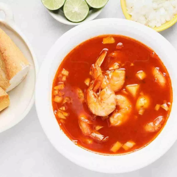 Delicious Mexican shrimp soup served in a white bowl