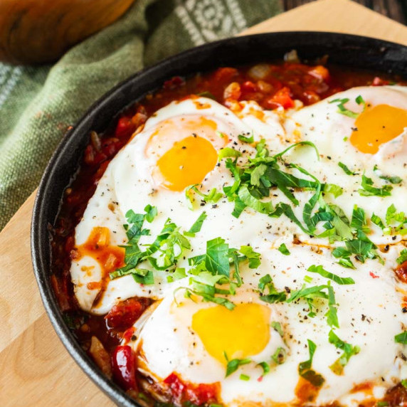 Mexican baked eggs in skillet.