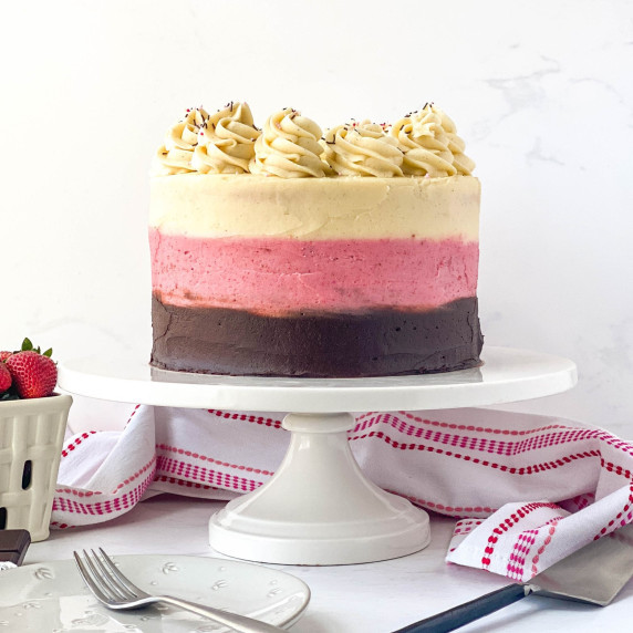 Neapolitan Cake with chocolate, strawberry, and vanilla bean cakes