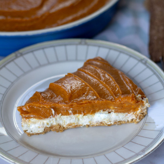 slice of No-Bake Double-Layer Pumpkin Pie on a white plate
