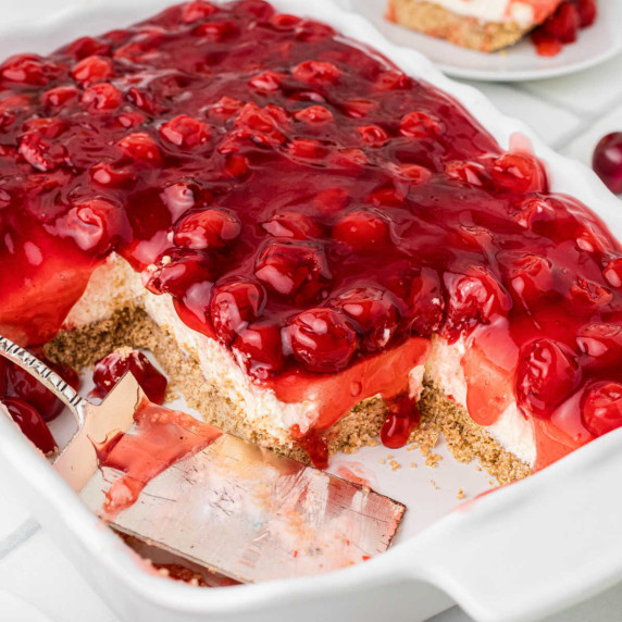Close up of some cherry delight with a spatula.