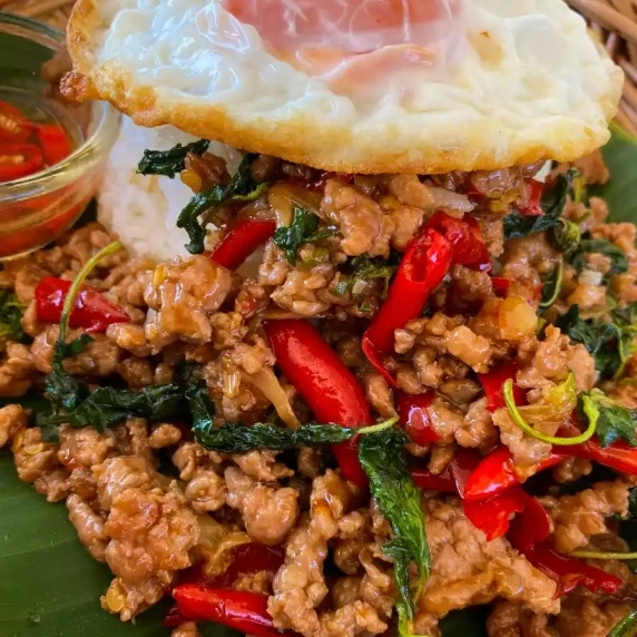 Pad kra pao with minced pork and a lot of red chilies with a deep fried egg on top.