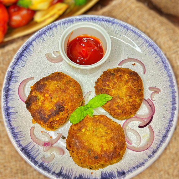 Shami kebab arranged in a plate placed on burlap sack 