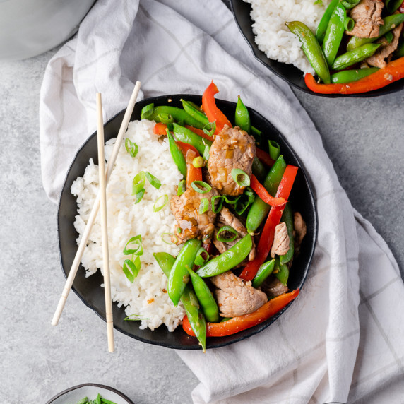 Fast & flavorful, this pork stir fry with snap peas makes a perfect weeknight recipe — gluten free, 