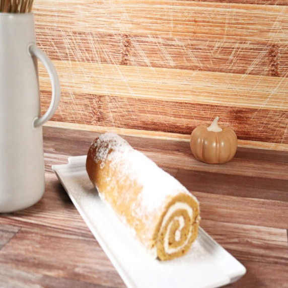 Pumpkin Cake Roll dusted with powdered sugar.
