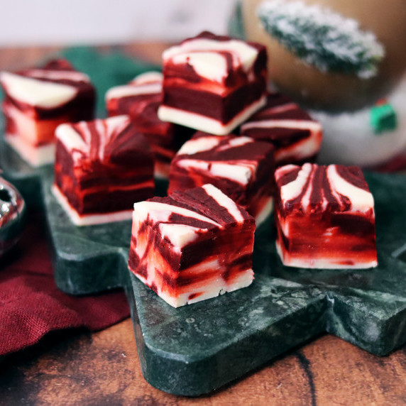 Red velvet fudge arranged on a holiday plate