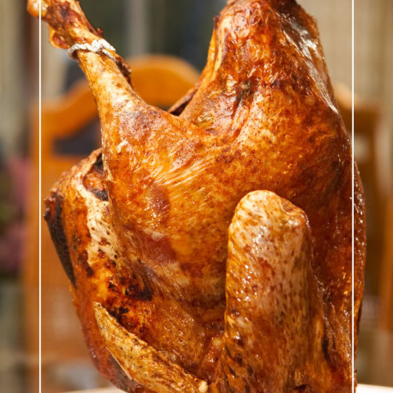 removing a fried turkey from a deep fryer