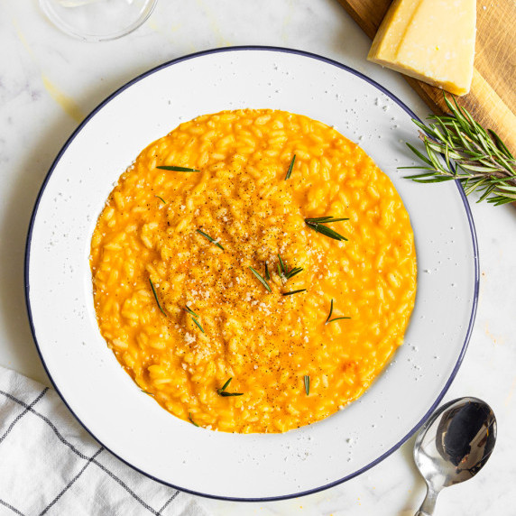 Pumpkin Sage risotto on a white plate