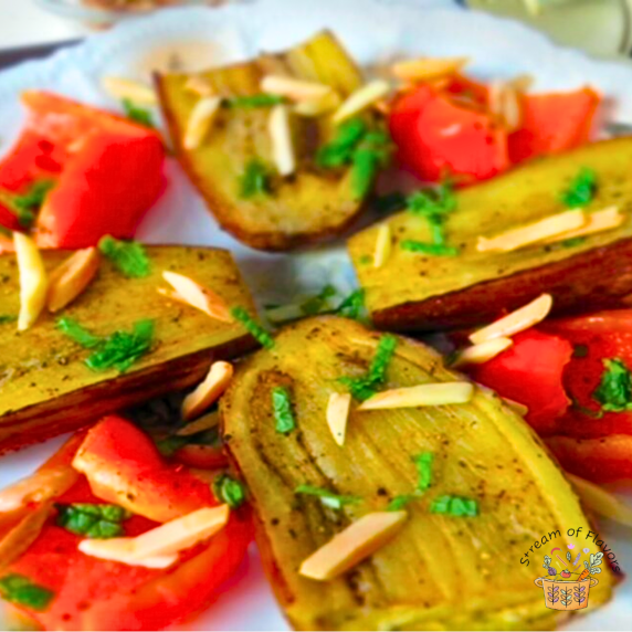 Roasted Eggplant and Peppers with olive oil, cayenne and ground pepper with toasted almonds and mint