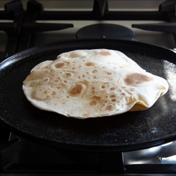 Whole wheat roti is the popular Indian flatbread frequently served with Indian vegetable and pulse d
