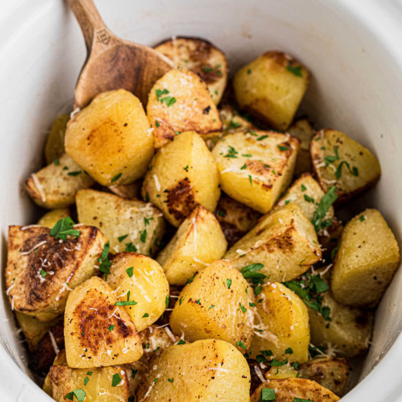 Close up of some slow cooker roast potatoes.