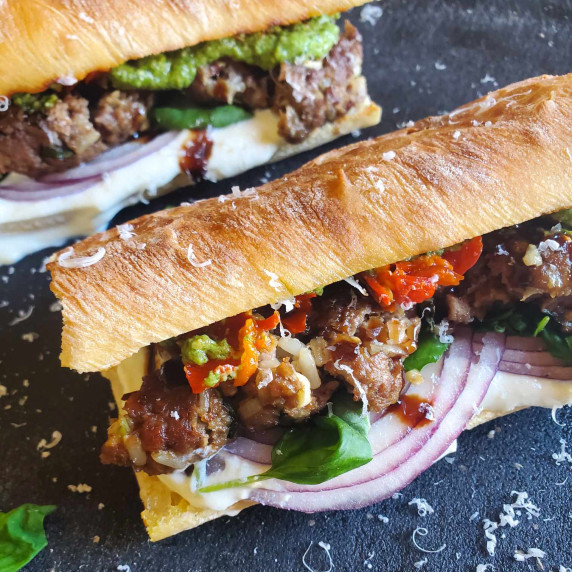 Golden brown ciabattas stuffed with colourful veggies and brown veggie meatballs.
