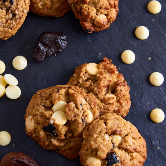 Tangy sourdough cookies with caramelized white chocolate, miso, oats and black garlic.