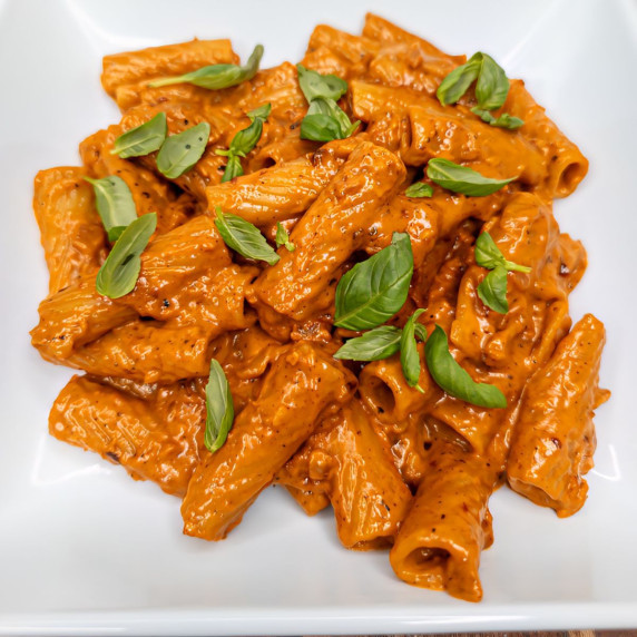 Spicy Rigatoni alla Vodka is a creamy, tomato-based pasta dish infused with vodka and Calabrian chil